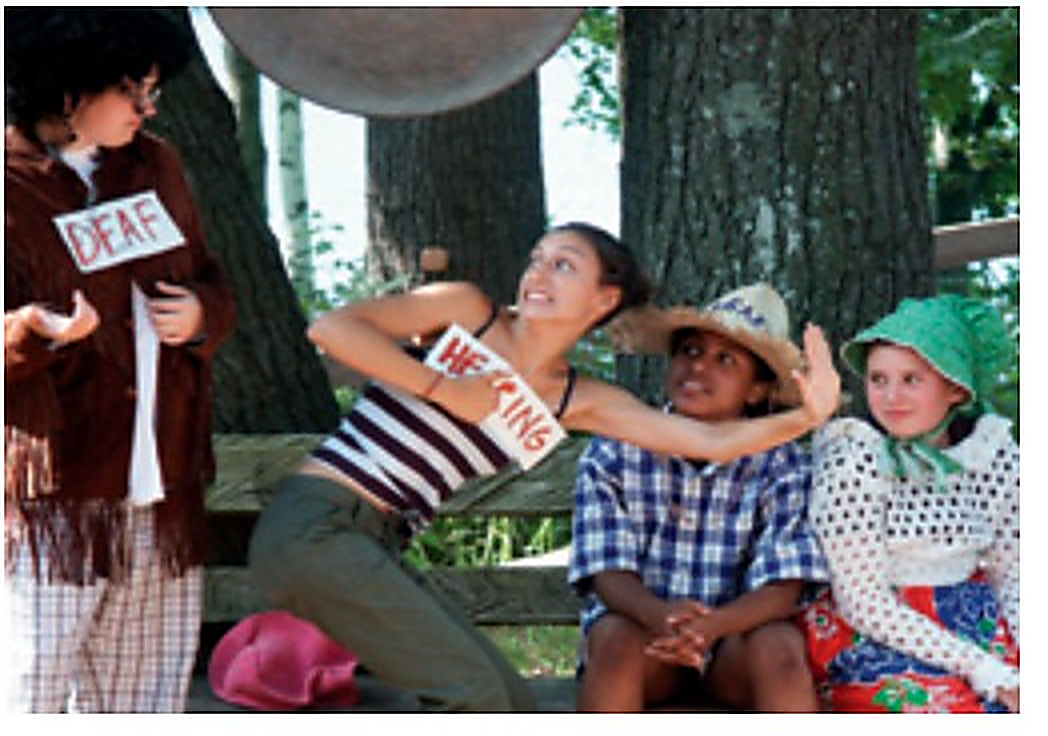 Historical Interlocken camp photo showing Deaf Plus participants during a performance